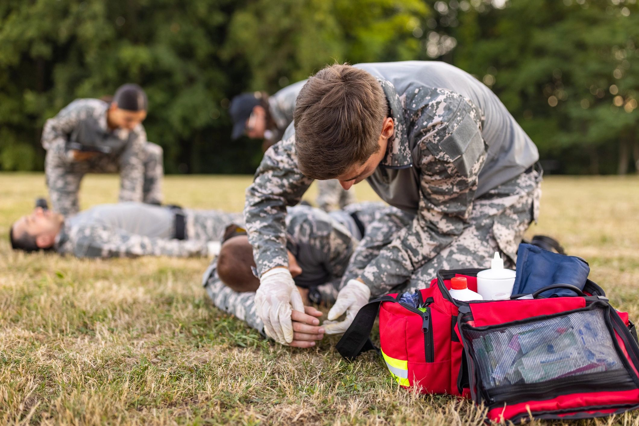 Team members taking part in first aid training