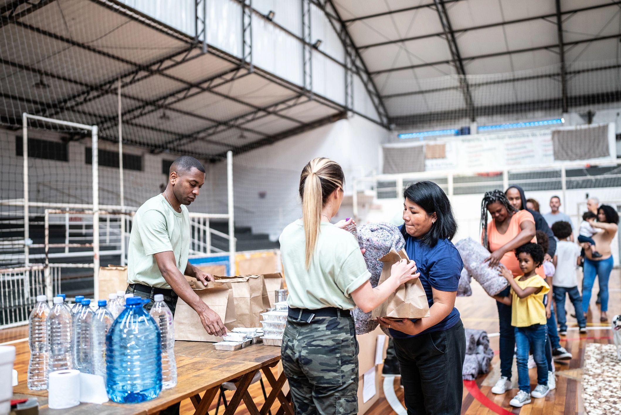 Volunteers delivering aid to people in need