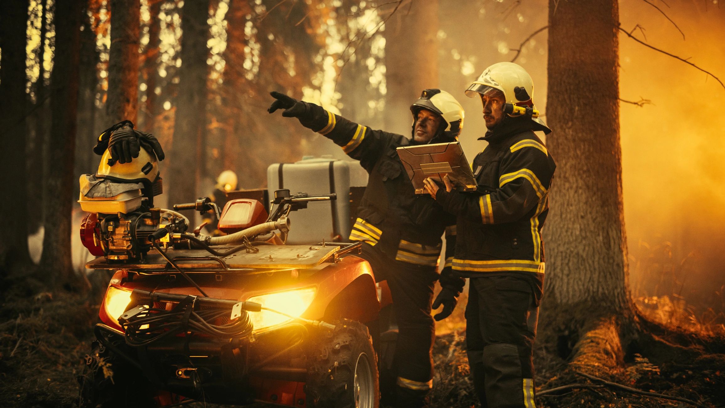 Rescue personnel planning operations outdoors