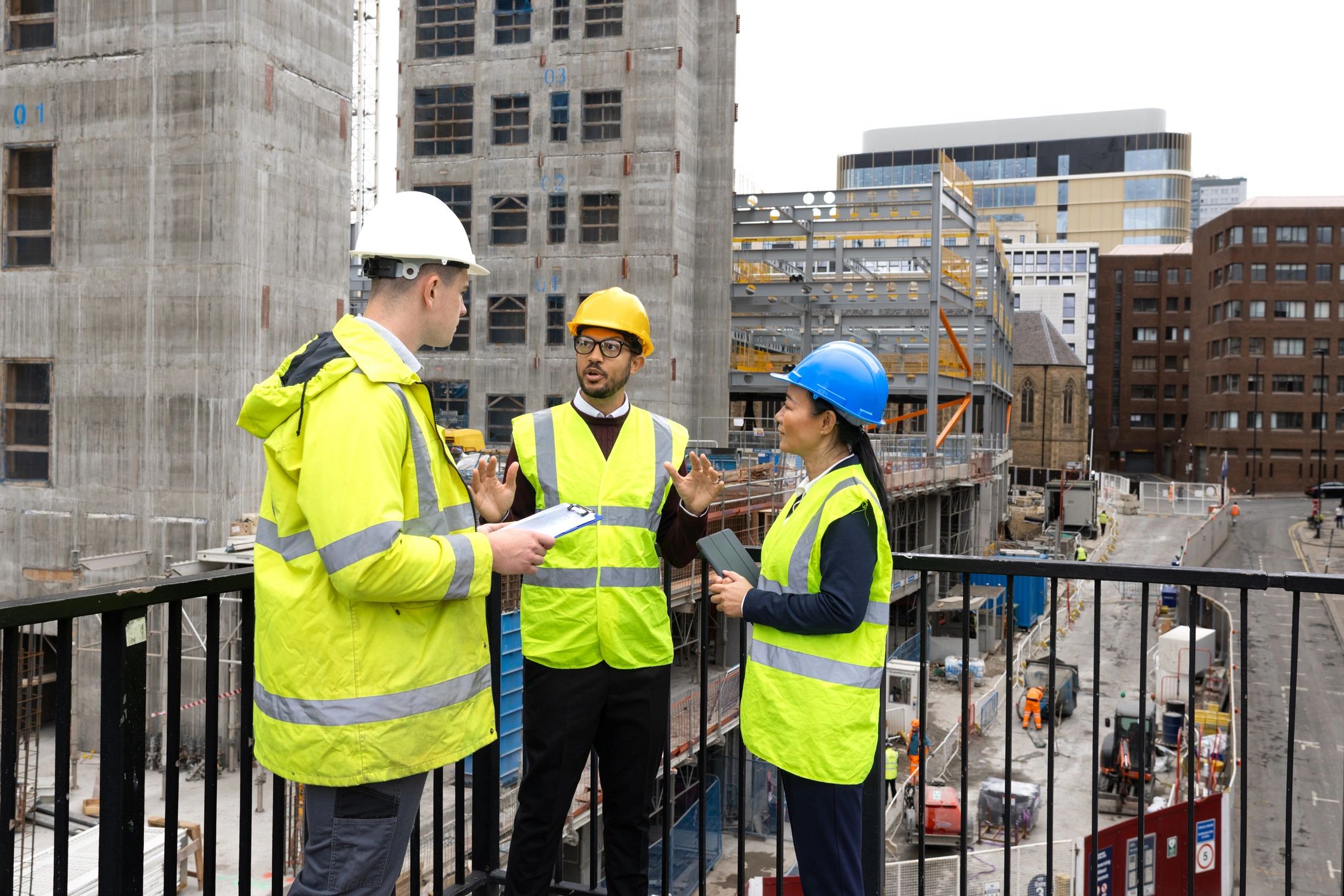 Team members reviewing documents and plans together