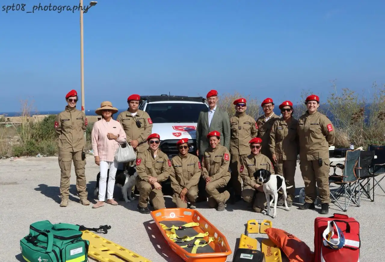 SAR Unit volunteers, canines and guests with rescue equipment