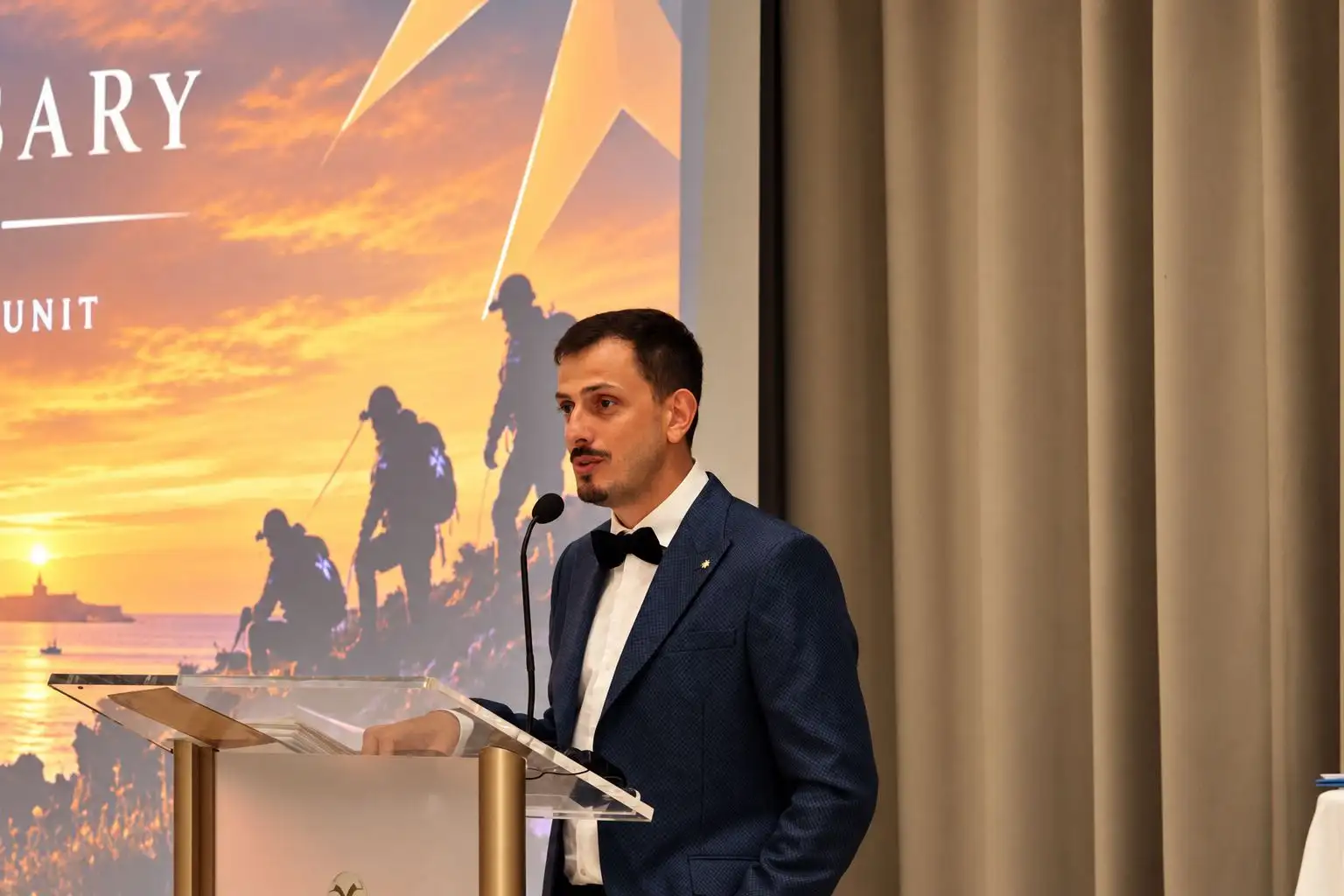 Unit Leader Simon Briffa addresses the gala dinner